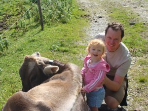 Annie patting the cow. 
