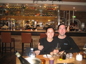 Ryan and Renata in front of the open kitchen. 